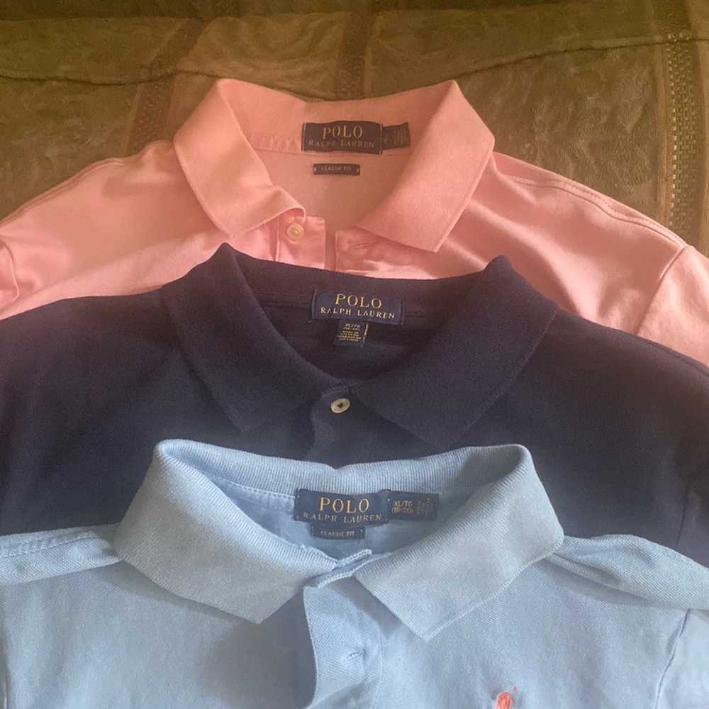 Three Ralph Lauren polo shirts